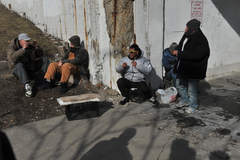 The homeless friends enjoy some companionship in the sunshine. (Al Podgorski, Chicago Sun-Times)