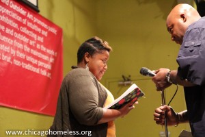 Wayne Richard prepares the mic for poet Clorinda Johnson in 2012 (Photos by Jeff Foy)