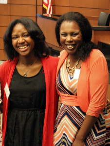 Aja celebrates her scholarship with Michele Washington, Payton’s former assistant principal.