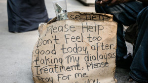 Signs created by the homeless along Michigan Avenue on Tuesday, September 1, 2015. (Hilary Higgins for RedEye)
