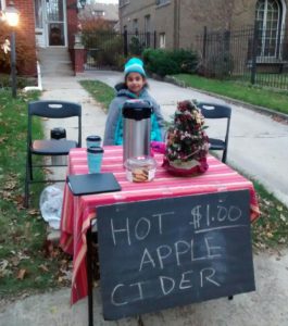 Peninah at her hot cider stand